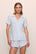 Model is wearing Gisele TENCEL™ Modal Relaxed Short PJ Set in Ice Blue/Ivory