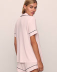 Model is wearing Gisele TENCEL™ Modal Relaxed Short PJ Set in Sorbet Pink/Black