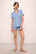 Model wears Gisele TENCEL™ Modal Relaxed Short PJ Set in wedgewood blue/ivory.