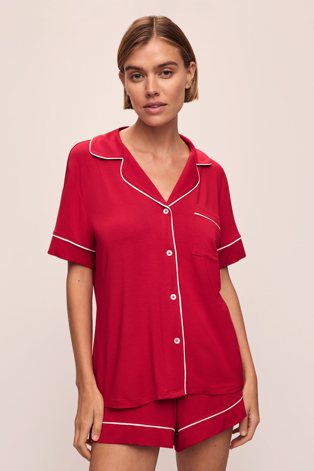 Model wears the Gisele TENCEL™ Modal Relaxed Short PJ Set in Haute Red/Ivory.