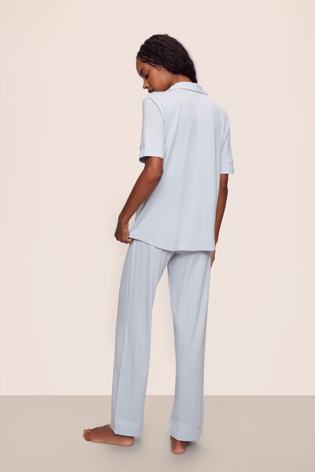 Model is wearing Gisele TENCEL™ Modal Short Sleeve & Pant PJ Set in Ice Blue/Ivory