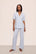 Model is wearing Gisele TENCEL™ Modal Short Sleeve & Pant PJ Set in Ice Blue/Ivory
