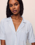 Model is wearing Gisele TENCEL™ Modal Short Sleeve & Pant PJ Set in Ice Blue/Ivory