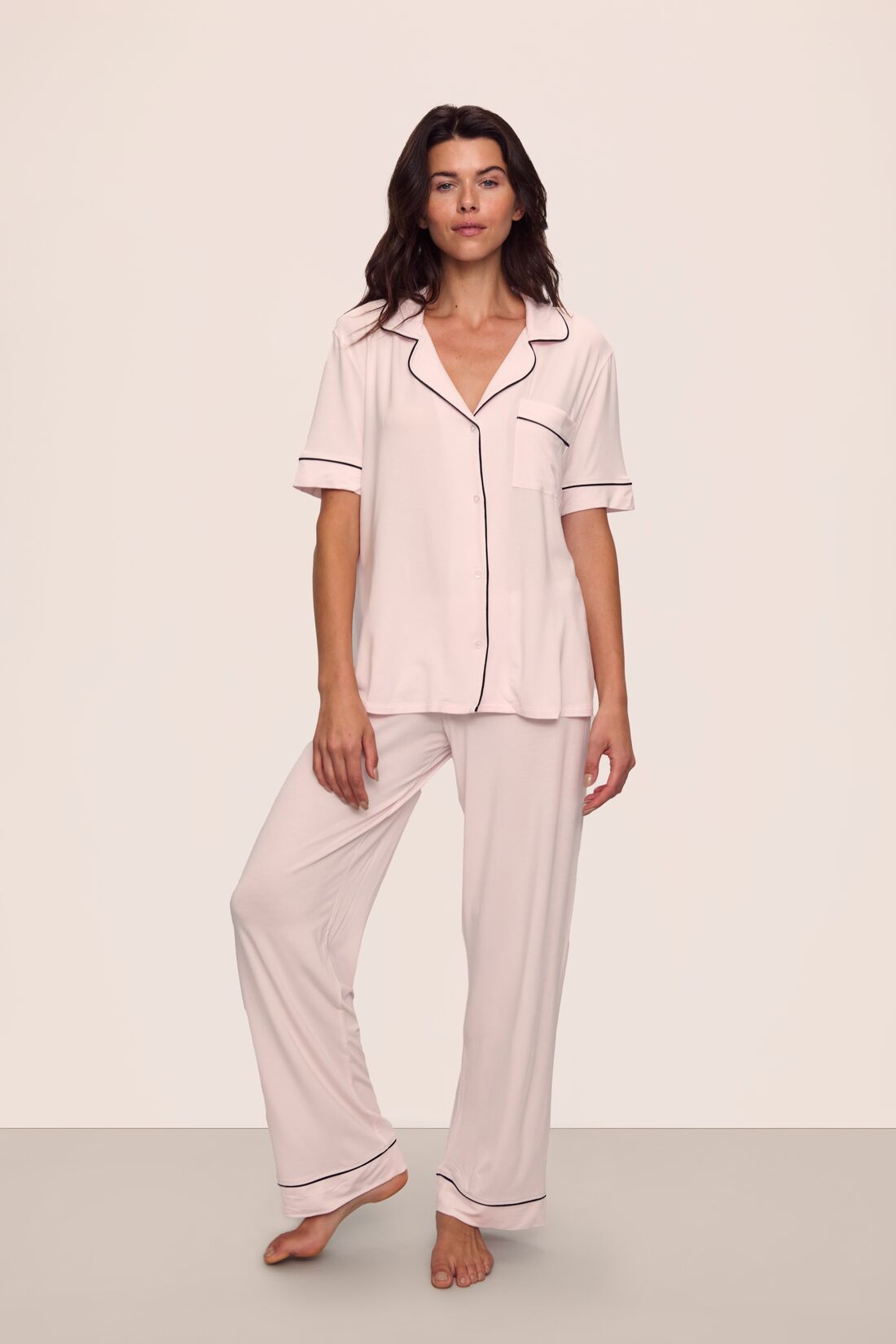 Model is wearing Gisele TENCEL™ Modal Short Sleeve & Pant PJ Set in Sorbet Pink/Black