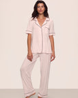 Model is wearing Gisele TENCEL™ Modal Short Sleeve & Pant PJ Set in Sorbet Pink/Black