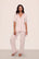 Model is wearing Gisele TENCEL™ Modal Short Sleeve & Pant PJ Set in Sorbet Pink/Black
