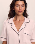 Model is wearing Gisele TENCEL™ Modal Short Sleeve & Pant PJ Set in Sorbet Pink/Black