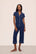 Model is wearing Gisele TENCEL™ Modal Short Sleeve Cropped PJ Set in Navy/Ivory