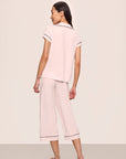 Model is wearing Gisele TENCEL™ Modal Short Sleeve Cropped PJ Set in Sorbet Pink/Black