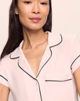 Model is wearing Gisele TENCEL™ Modal Short Sleeve Cropped PJ Set in Sorbet Pink/Black