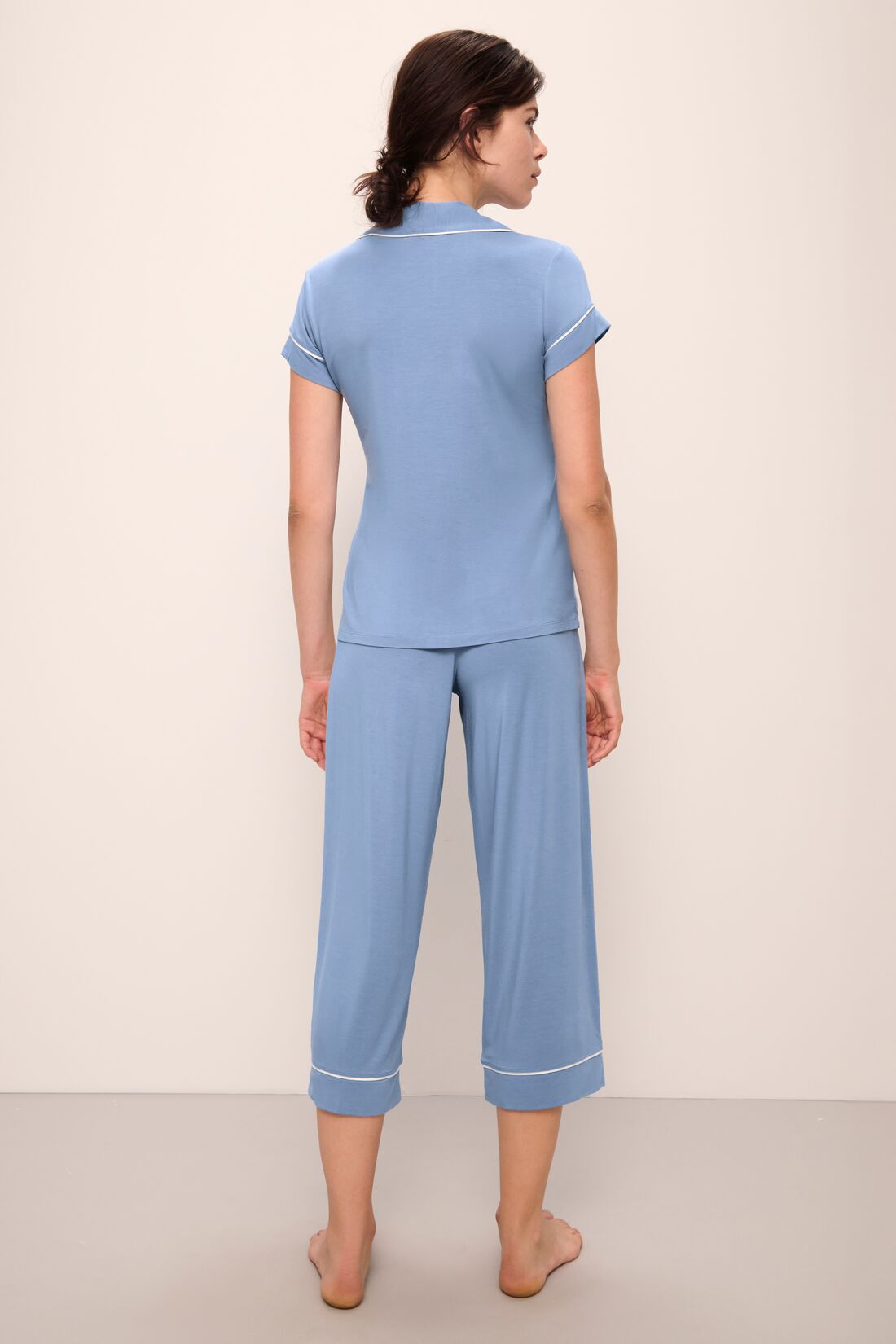 Model wears Gisele TENCEL™ Modal Short Sleeve Cropped PJ Set in wedgewood blue/ivory.