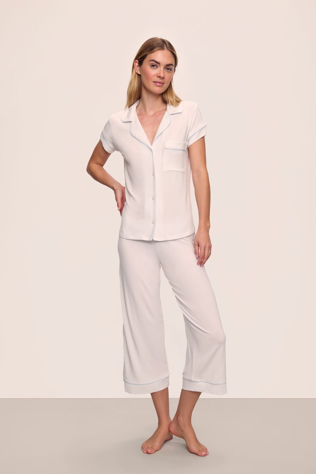 Model is wearing Gisele TENCEL™ Modal Short Sleeve Cropped PJ Set in White/Ice Blue