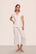 Model is wearing Gisele TENCEL™ Modal Short Sleeve Cropped PJ Set in White/Ice Blue