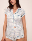 Model wears Gisele Printed TENCEL™ Modal Shortie Short PJ Set in Petite Batik Ivory/Denim Blue.