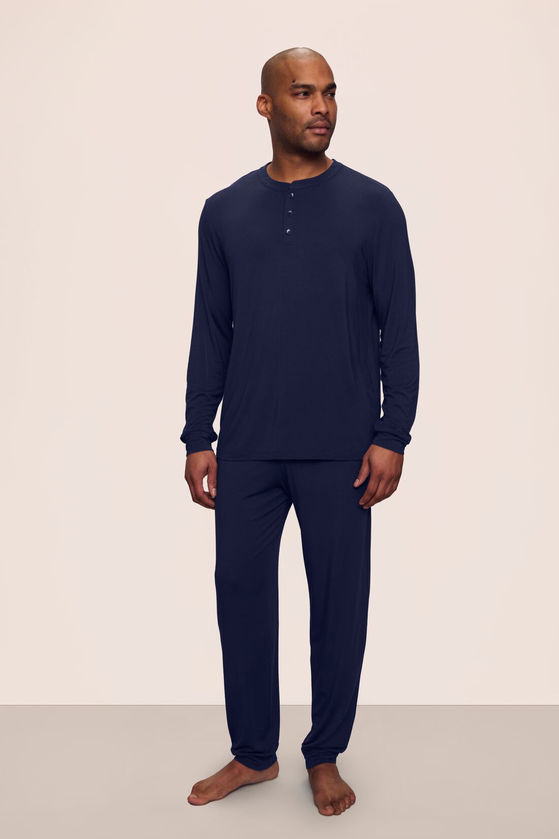 Model is wearing Henry TENCEL™ Modal Long PJ Set in Navy