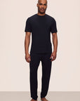 Model is wearing Henry TENCEL™ Modal Short Sleeve & Pant PJ Set in Black