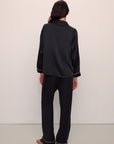 Model is wearing Inez Washable Silk Long PJ Set in Black/Champagne