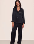Model is wearing Inez Washable Silk Long PJ Set in Black/Champagne