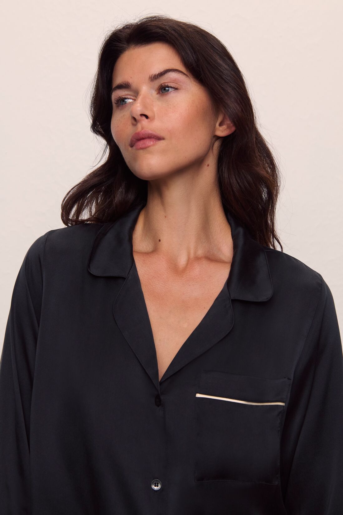 Model is wearing Inez Washable Silk Long PJ Set in Black/Champagne