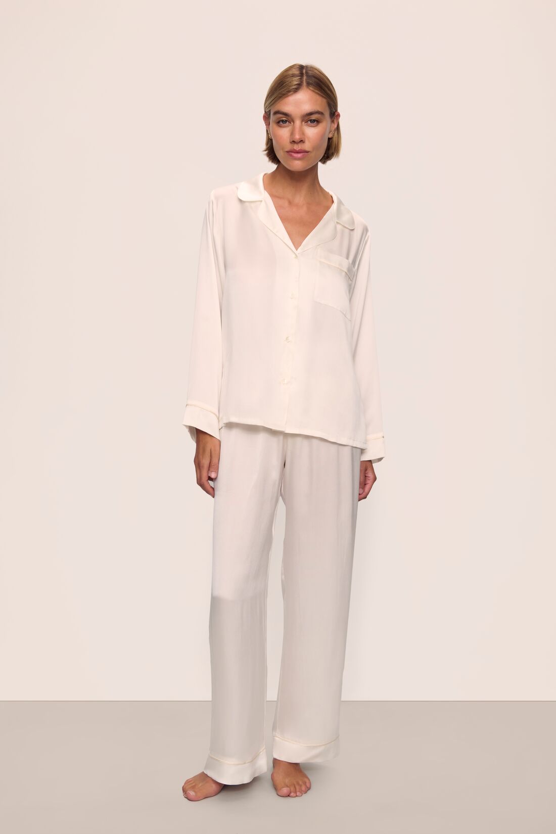 Model is wearing Inez Washable Silk Long PJ Set in Ivory/Champagne