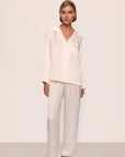Model is wearing Inez Washable Silk Long PJ Set in Ivory/Champagne
