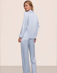Model is wearing Inez Washable Silk Long PJ Set in Powder Blue/Champagne