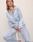 Model is wearing Inez Washable Silk Long PJ Set in Powder Blue/Champagne