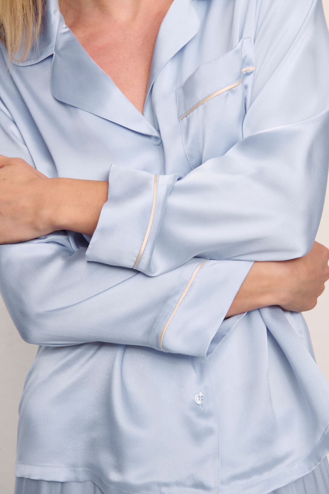Model is wearing Inez Washable Silk Long PJ Set in Powder Blue/Champagne