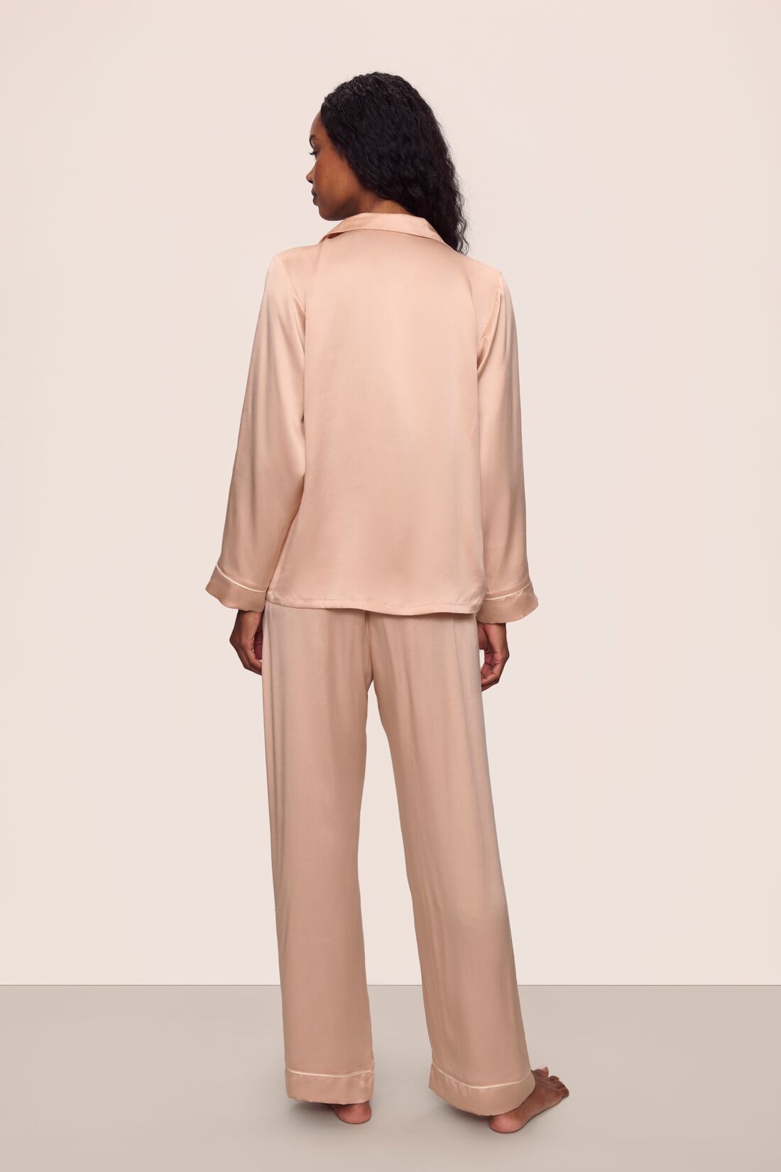 Model is wearing Inez Washable Silk Long PJ Set in Rose Cloud/Champagne