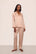Model is wearing Inez Washable Silk Long PJ Set in Rose Cloud/Champagne