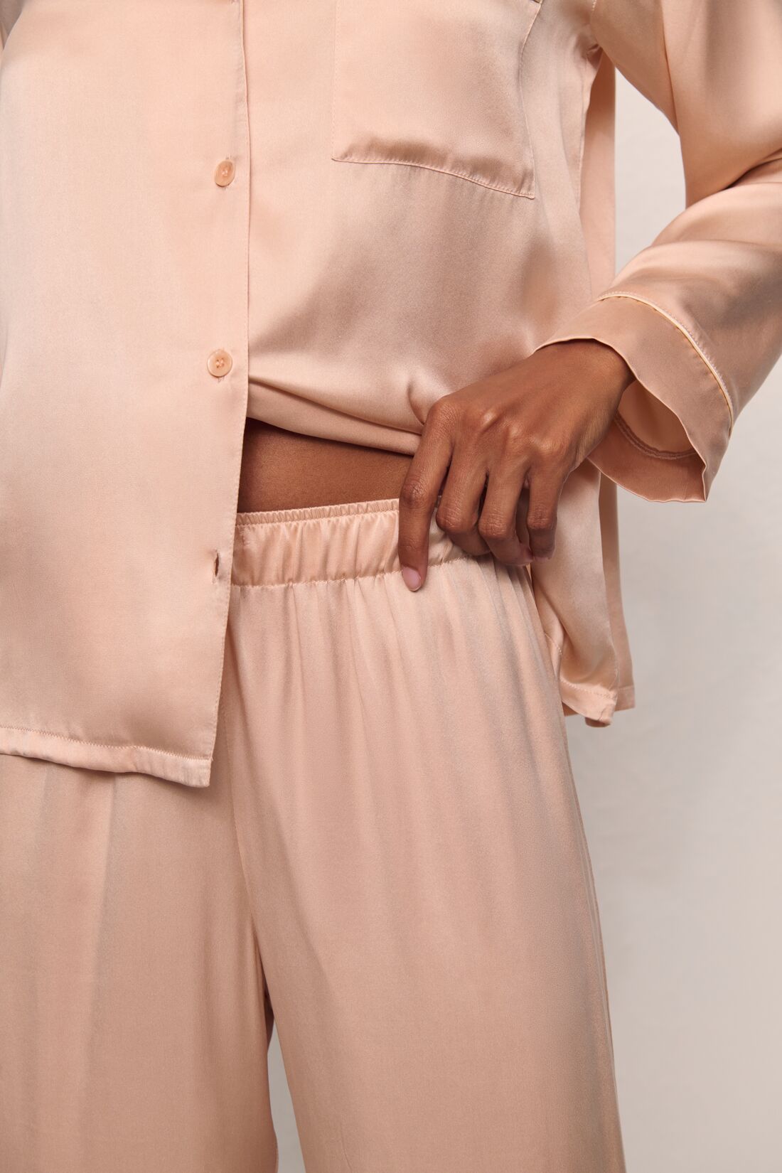 Model is wearing Inez Washable Silk Long PJ Set in Rose Cloud/Champagne
