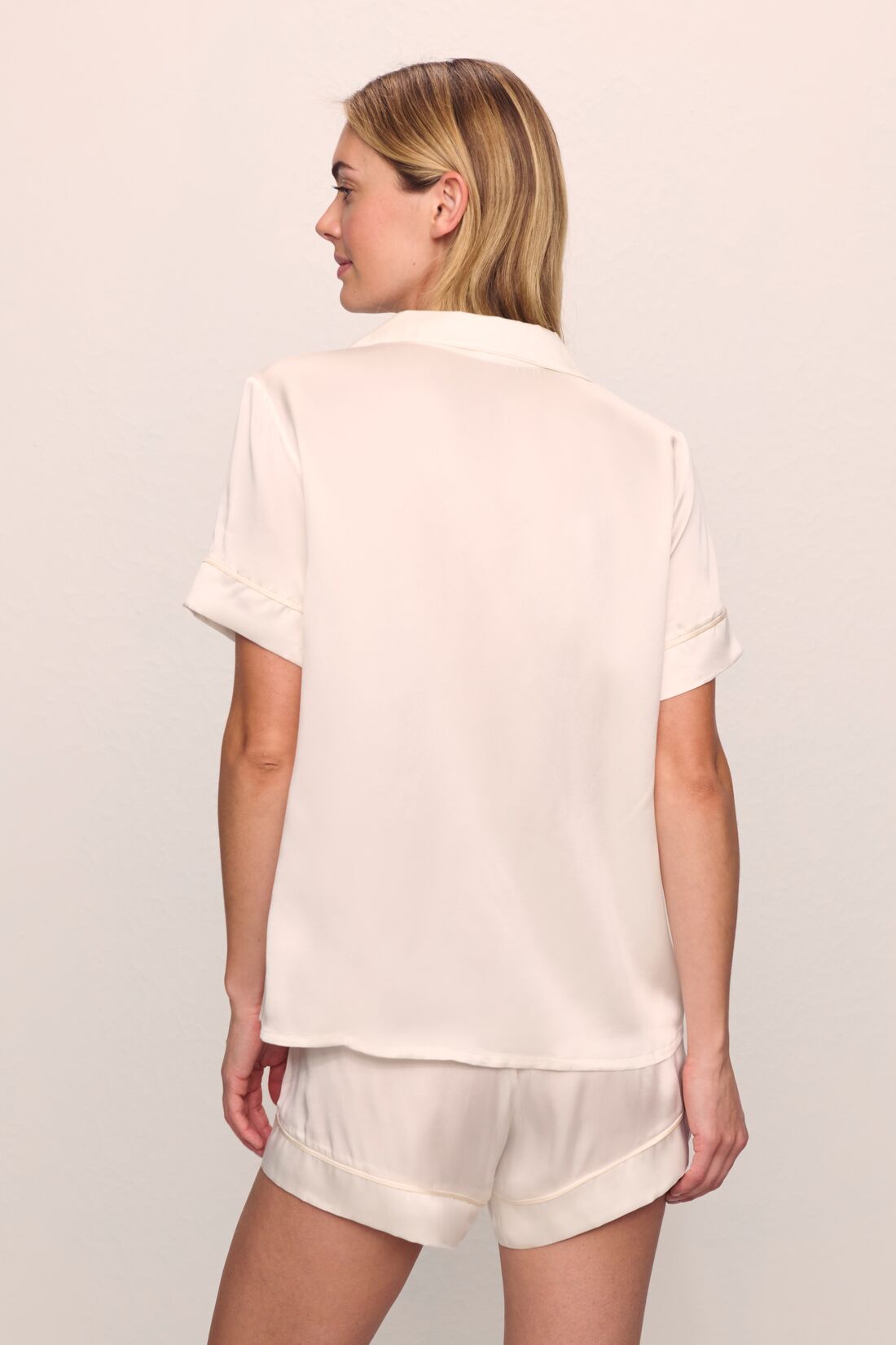 Model is wearing Inez Washable Silk Short PJ Set in Ivory/Champagne