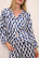 Model wears Inez Washable Silk Printed Long PJ Set in Mosaic Tile Denim/Powder Blue.