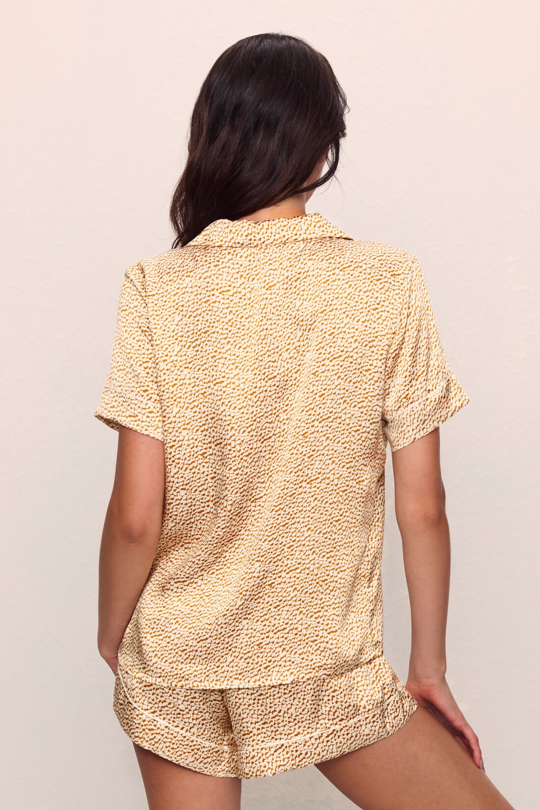 Model is wearing Inez Washable Silk Printed Short PJ Set in Mink Puff/Ivory