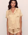 Model is wearing Inez Washable Silk Printed Short PJ Set in Mink Puff/Ivory