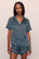 Model is wearing Inez Washable Silk Printed Short Set in Petite batik Navy/Ivory
