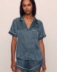 Model is wearing Inez Washable Silk Printed Short Set in Petite batik Navy/Ivory