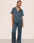 Model is wearing Inez Washable Silk Printed Short Sleeve Pant PJ Set in Petite Batik Navy/Ivory