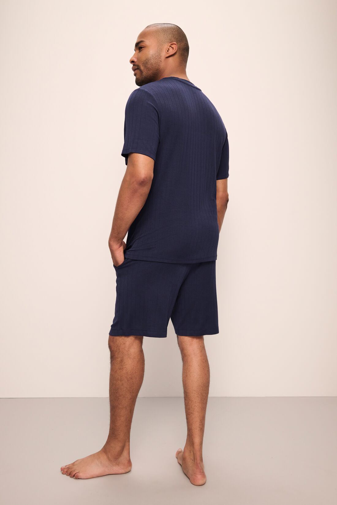Model wears Henry TENCEL™ Modal Rib Short PJ Set in True Navy.