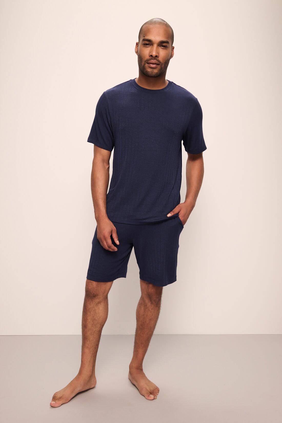 Model wears Henry TENCEL™ Modal Rib Short PJ Set in True Navy.