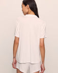 Model is wearing Gisele TENCEL™ Modal Rib Relaxed Short PJ Set in White