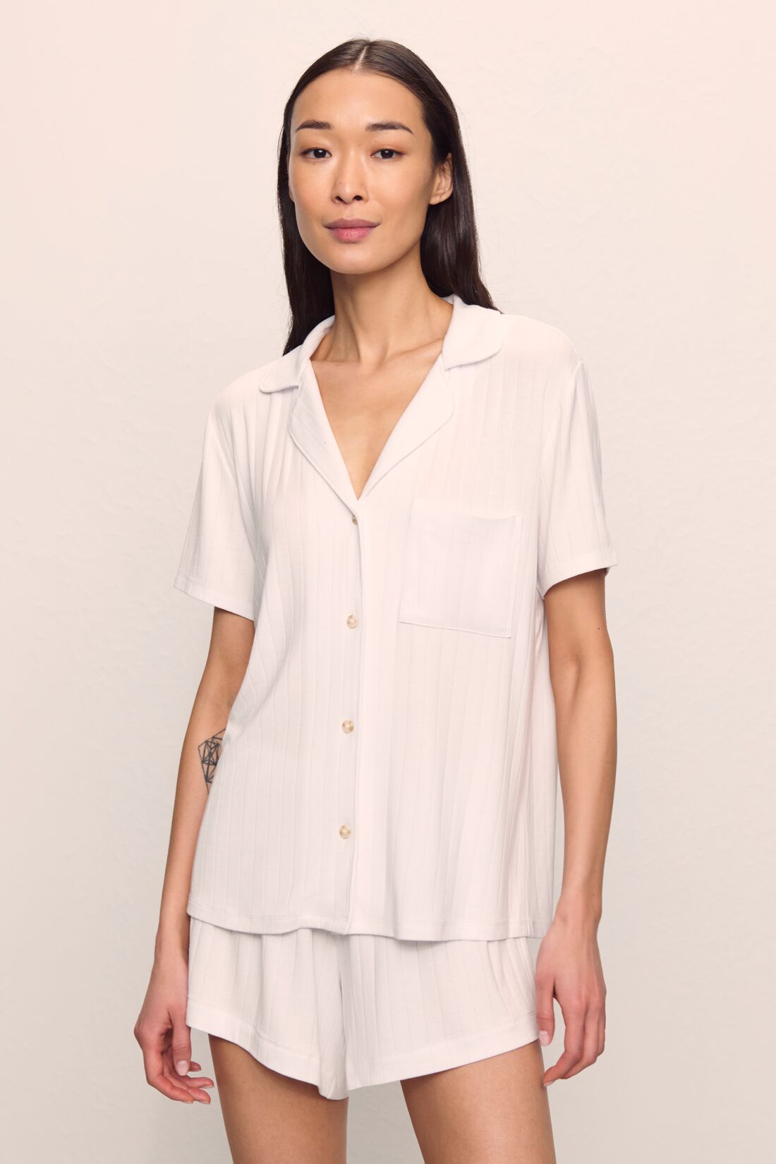 Model is wearing Gisele TENCEL™ Modal Rib Relaxed Short PJ Set in White