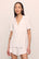 Model is wearing Gisele TENCEL™ Modal Rib Relaxed Short PJ Set in White