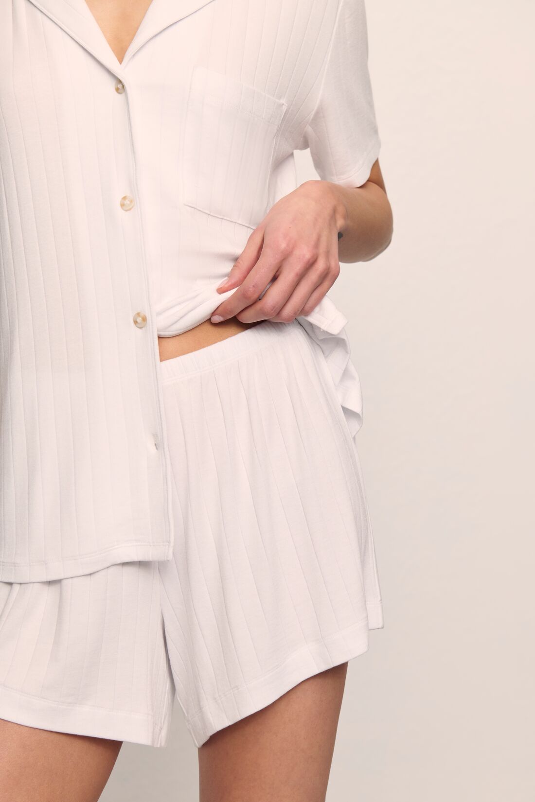 Model is wearing Gisele TENCEL™ Modal Rib Relaxed Short PJ Set in White