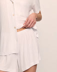 Model is wearing Gisele TENCEL™ Modal Rib Relaxed Short PJ Set in White