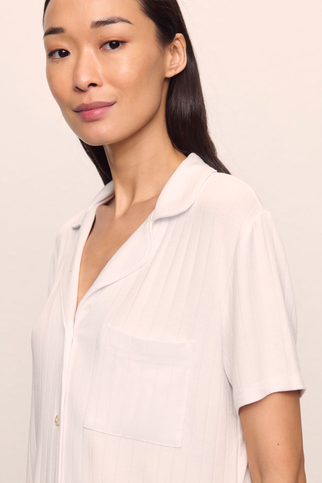 Model is wearing Gisele TENCEL™ Modal Rib Relaxed Short PJ Set in White