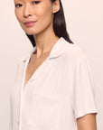 Model is wearing Gisele TENCEL™ Modal Rib Relaxed Short PJ Set in White