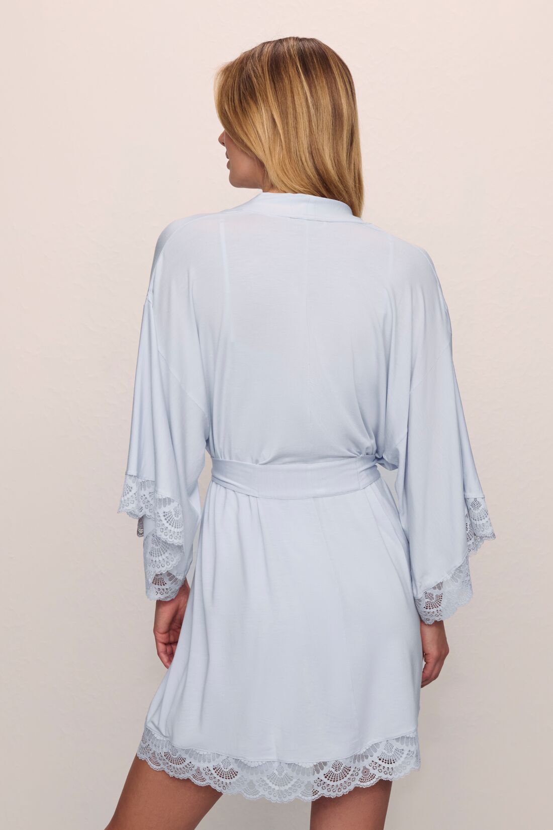Model wears Mariana TENCEL™ Modal Robe in Ice Blue.