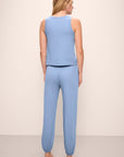 Model wears the Aloe Cotton Pant in Wedgewood Blue.
