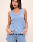 Model wears the Aloe Cotton Tank in Wedgewood Blue.
